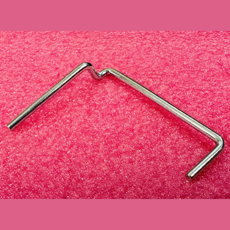 Пружина оси палеты траволатора правая GAA94BF1 Otis